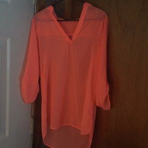 Beautiful tunic. With jewels on the shoulders